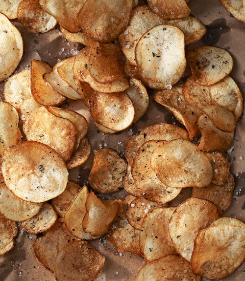 <p>Prepared from scratch with paper-thin slices of russet potatoes and a sprinkling of fresh rosemary, crunchy sea salt, and crackled pepper, this is the perfect snack to munch on throughout the game.</p>
<p><strong>Recipe:</strong> <a href="http://www.countryliving.com/recipefinder/crispy-rosemary-potato-chips-recipe-clv0211" target="_blank">Crispy Rosemary Potato Chips</a><br /><br /></p>