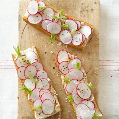 <p>These fresh sandwiches from Alain Ducasse, author of <em><a href="http://www.amazon.com/Alain-Ducasse-Nature-Simple-Healthy/dp/0847838404/ref=sr_1_fkmr0_1?ie=UTF8&qid=1340287633&sr=8-1-fkmr0&keywords=Nature%3A+Simple%2C+Healthy%2C+and+Good%26%238203%3B" target="_blank">Nature: Simple, Healthy, and Good</a></em><a href="http://www.amazon.com/Alain-Ducasse-Nature-Simple-Healthy/dp/0847838404/ref=sr_1_fkmr0_1?ie=UTF8&qid=1340287633&sr=8-1-fkmr0&keywords=Nature%3A+Simple%2C+Healthy%2C+and+Good%26%238203%3B" target="_blank"></a>, are full of crunchy, peppery radishes. Slathering sweet, salted butter on the bread gives them a decidedly French twist.</p>
<p><strong>Recipe:</strong> <a href="http://www.countryliving.com/recipefinder/radish-tartines-recipe-clv0712" target="_blank">Radish Tartines</a></p>