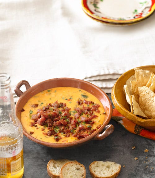 <p>If you're short on time, use canned roasted poblanos instead.</p>
<p><strong>Recipe:</strong> <a href="http://www.countryliving.com/recipefinder/queso-fundido-roasted-poblano-peppers-chorizo-recipe-clv0512" target="_blank">Queso Fundido with Roasted Poblano Peppers and Chorizo</a></p>