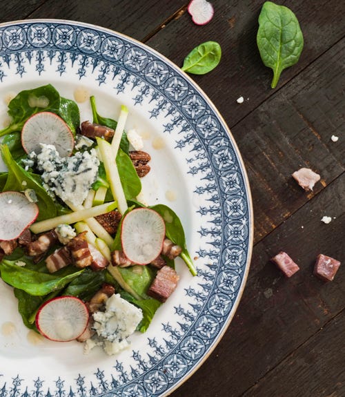 <p>Creamy and crunchy, hearty and light: This starter is a symphony of delectable contradictions. And kudos to Edward Lee for the ingeniously toothsome pairing of green apples and breakfast radishes.</p>
<p><strong> Recipe:</strong> <a href="http://www.countryliving.com/recipefinder/spinach-salad-bacon-blue-cheese-bourbon-vinaigrette-recipe-clv0513" target="_blank">Spinach Salad with Bacon, Blue Cheese, and Bourbon Vinaigrette</a></p>