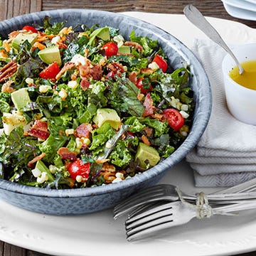 <p><span>Tomatoes, pecans, bacon, and more top a hearty salad of kale and collards, which is meant to be served at room temperature.</span></p>
<p><strong>Recipe:</strong> <a href="http://www.countryliving.com/recipefinder/chopped-collard-kale-salad-lemon-garlic-dressing-recipe-clv0813" target="_blank">Chopped Collard and Kale Salad with Lemon-Garlic Dressing</a></p>