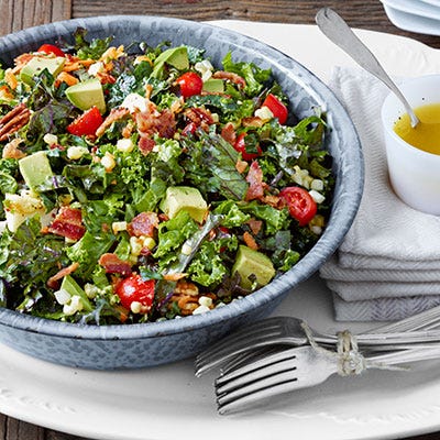 <p><span>Tomatoes, pecans, bacon, and more top a hearty salad of kale and collards, which is meant to be served at room temperature.</span></p>
<p><strong>Recipe:</strong> <a href="http://www.countryliving.com/recipefinder/chopped-collard-kale-salad-lemon-garlic-dressing-recipe-clv0813" target="_blank">Chopped Collard and Kale Salad with Lemon-Garlic Dressing</a></p>