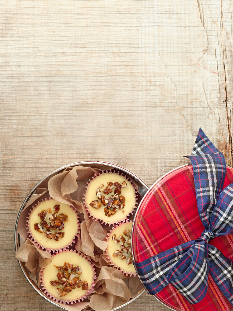 <p>These marvelous mini cheesecakes, with a sweet pecan topping and buttery shortbread crust, are perfect to serve guests at a holiday dinner party or to give away as a gift.</p>
<p><strong>Recipe:</strong> <a href="http://www.countryliving.com/recipefinder/mini-cheesecakes-sugared-pecans-recipe-clx1213" target="_blank">Mini Cheesecakes with Sugared Pecans</a></p>