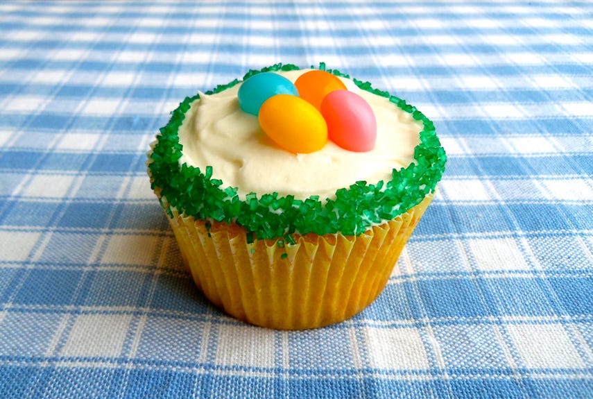 <p>These sweet and tangy cakes hold a surprise inside — a little pocket of luscious, silky curd. The mascarpone frosting takes this impressive dessert to the next level. For a more adult-friendly decoration, try edible flowers.</p>