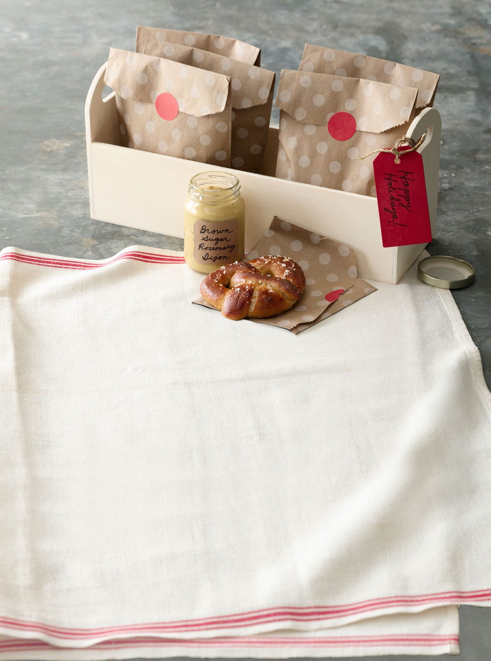 <p>Everyone loves the classic combination of tangy mustard and soft, salty pretzels. So dress this treat for Christmas, with a stepped up, sweet and herbaceous Dijon for dipping.</p>
<p><strong>Recipe:</strong> <a href="http://www.countryliving.com/recipefinder/pretzels-brown-sugar-rosemary-dijon-recipe-clx1213" target="_blank">Pretzels with Brown-Sugar Rosemary Dijon</a></p>