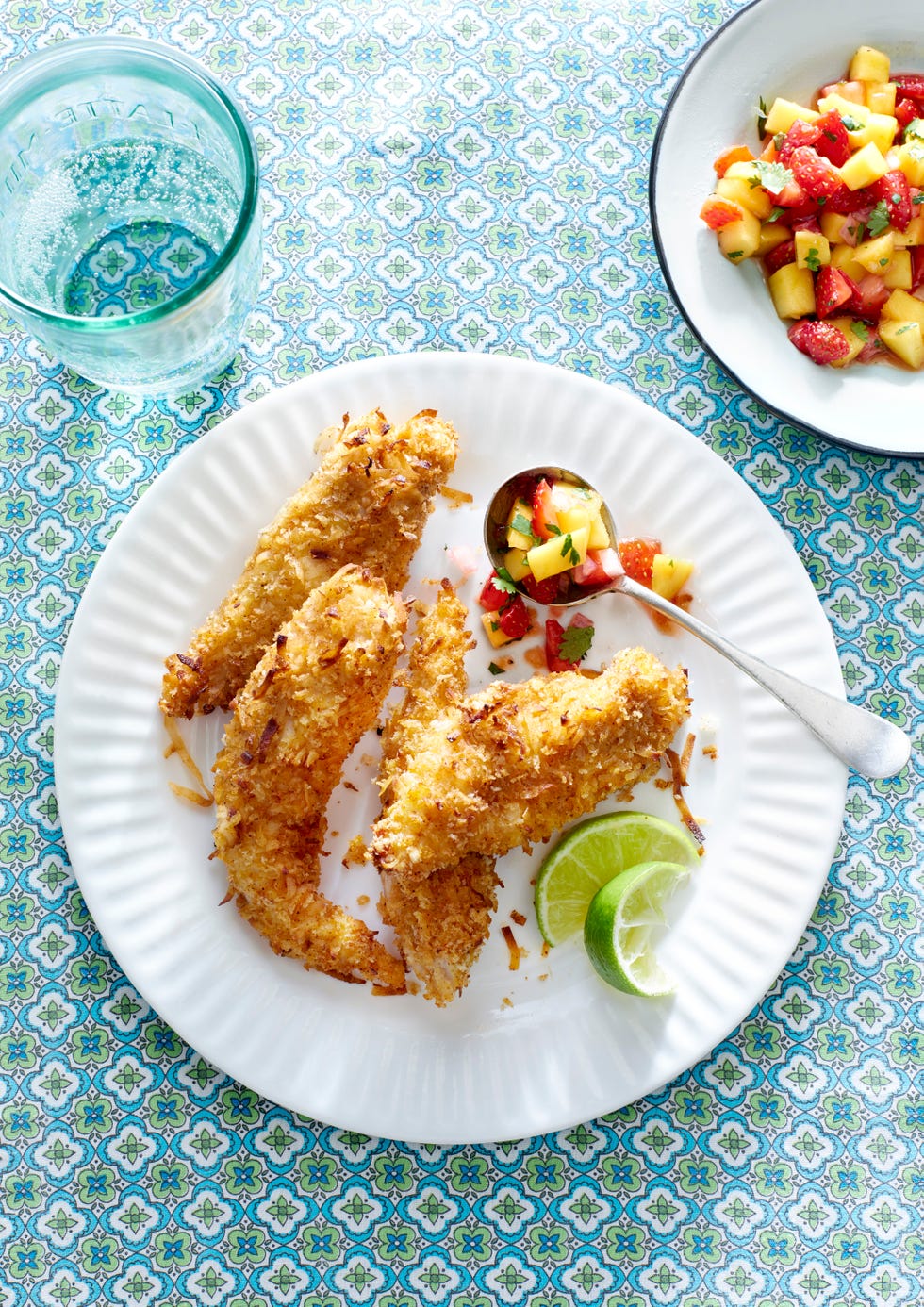 <p>Tender and oven-fried, these chicken tenders get an extra kick of flavor from coconut.</p>
<p><strong>Recipe:</strong> <a href="baked-coconut-tenders-strawberry-mango-salsa-recipe-clx0315" target="_blank"><strong>Baked Coconut Tenders with Strawberry-Mango Salsa</strong></a></p>