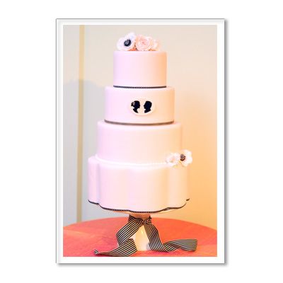 <p>Kristine Bender's Bride and Groom Silhouette Cake features a fondant-covered almond cake with custom silhouette plaque, black and white ribbons, and sugar sweet peas, anemones, and ranunculus. To complement the pink theme, the cake is layered with strawberry cream.</p>
<br />
<p>K. Rose Cakes, Washington, D.C.</p>
<p>(202) 255-8709</p>
<p><a href="http://www.krosecakes.com/" target="_new"><b>krosecakes.com</b></a></p>