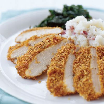 These cornflake-coated chicken breasts are baked, not fried. The zesty mix of herbs and spices in the coating will banish baked-chicken boredom. Calories in original recipe for fried chicken: 495; makeover: 290. Fat in the original recipe: 30 g; makeover: 4 g.
  Recipe: Super-Crunchy "Fried" Chicken