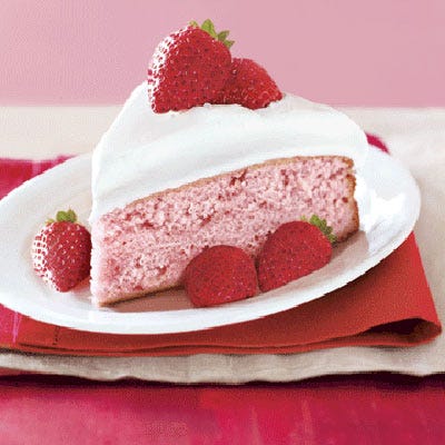For a quicker and almost-homemade strawberry cake, let white cake mix stand in for a cake made from scratch. Reduce the liquid called for in the mix by 1/3 cup and add 1 cup strawberry preserves and 1/8 teaspoon red food coloring. Bake the two 9-inch layers according to package instructions. Shorten the process (and cleanup) even more by using store-bought whipped cream. Top with strawberries and 1/4 cup preserves.