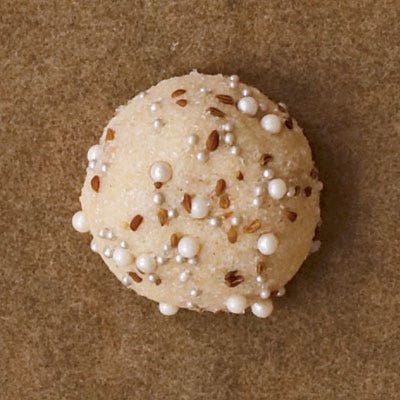 <p>It's easy to give sugar cookies a decorative touch. Simply shape 1 1/2 tablespoonfuls of dough into balls. Then roll them over a mix of sugars, nonpareils, dragées, or seeds such as anise, poppy, or sesame. Chill for 20 minutes and bake for 20 minutes.</p><br />
<p><b>Recipe: </b><a href="/recipefinder/sugar-cookie-dough-clv1207"target="_new"><b>Sugar Cookie Dough</b></a></p>