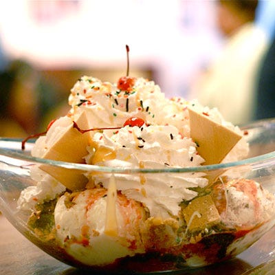 Tchoupitoulas Sundae <b>Where to Buy It:</b> <a href="http://www.creolecreamery.com/" target="_blank">The Creole Creamery</a> on Prytania St. or Vicksburg St.<br />
<b>Location:</b> New Orleans, LA<br />
<b>Ingredients:</b> Eight scoops of ice cream, eight toppings, whipped cream, cherries, sprinkles, and sugar wafers. Customers may choose their favorite toppings and flavors, including Strawberry Jalepeño Cheesecake.<br />
<b>Cost:</b> $25<br /><br />
<b>Make Your Own:</b><br />
<a href="/recipefinder/sour-cream-ice-cream-pears"target="_new"><b>Sour Cream Ice Cream</b></a>, <a href="/recipefinder/praline-chocolate-chip-ice-cream-recipe-8632"target="_new"><b>Praline-Chocolate Chip Ice Cream</b></a>