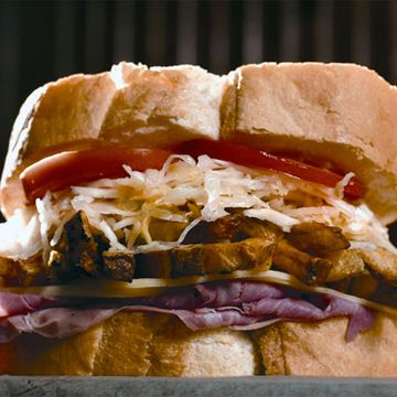 <b>Where to get it:</b> Pittsburgh Steelers' Heinz Field<br />
<b>Who's cooking:</b> <a href="https://www.primantibros.com/" target="_blank">Primanti Bros.</a><br />
<b>Ingredients:</b> This meal-in-a-sandwich is famous in the Burgh. It contains capicola, provolone cheese, fresh-cut French fries, coleslaw, and tomatoes served on fresh Italian bread.<br />
<b>Cost:</b> $7<br /><br />

<b>Make your own:</b><br />
<a href="/recipefinder/provencal-pork-sandwich-recipe"target="_new"><b>Provençal Pork Sandwich</b></a>, <a href="/recipefinder/home-fries-recipe-3730"target="_new"><b>Home Fries</b></a>