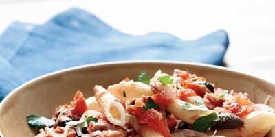 Common kitchen staples take on a Mediterranean flair when tossed together in this dish. The amount of tuna used here equals half of a typical can of Italian tuna; use the other half for a sandwich or salad.<br /><br /><b>Recipe: <a href="/recipefinder/penne-tuna-plum-tomatoes-black-olives-recipe" target="_blank">Penne with Tuna, Plum Tomatoes, and Black Olives</a></b>

