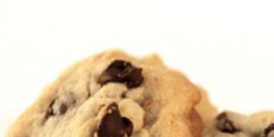 A simple cooking error led to the creation of the now-classic Nestlé Toll House Chocolate Chip Cookie. In 1930, Ruth Wakefield, who ran the Toll House Inn in Massachusetts, added chopped pieces of a semi-sweet chocolate bar to her Butter Drop Do cookie dough, expecting the chunks to melt. But the chocolate only softened and held its shape. The cookies were a hit at her inn. Eventually Ruth's recipe was published in a Boston newspaper and ended up on the wrapper of the Nestlé semi-sweet chocolate bar.<br /><br />
Check out these <a href="/search/fast_search_recipes/?search_term=chocolate chip cookies" target="_blank"><b>chocolate chip cookie recipes</b></a>.