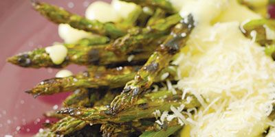 Chef <a href="http://www.mariobatali.com/" target="_blank">Mario Batali</a> chars his asparagus on the grill, then serves it with a superrich zabaglione sauce spiked with black pepper.<br /><br /><b>Recipe: <a href="/recipefinder/grilled-asparagus-pepper-zabaglione-recipe-fw0410" target="_blank">Grilled Asparagus with Pepper Zabaglione</a></b>
