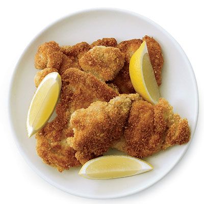 A layer of flour seasoned with celery salt, garlic salt, and cayenne under the panko breadcrumbs adds a hint of flavor to these crispy chicken tenders.<br /><br /><b>Recipe: <a href="/recipefinder/oven-fried-chicken-recipe-fw0410" target="_blank">Oven-Fried Chicken</a></b>
