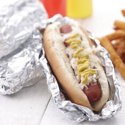 New York Yankees Nathan's Hot Dog <p><b>Stadium:</b> <a href="http://newyork.yankees.mlb.com/nyy/ballpark/index.jsp" target="_blank">Yankee Stadium</a></p>
<p><b>Why It's a Hit:</b> Classic New York. Yankee Stadium's signature <a href="http://www.nathansfamous.com/PageFetch/"target="_blank">Nathan's Famous</a> hot dog is as iconic as George Steinbrenner. Like the Mets, the Yankees moved to a new and improved ballpark in 2009, but their passionate fans got to keep their classic all-beef natural-casing hot dog served boiled (a water dog) on
a steamed bun. </p>