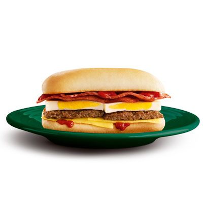 <b>Where to Place Your Order: </b> McDonald's, Australia<br />
<b>What You Get: </b> Two slices of bacon layered with a freshly cooked egg, cheese, and a sausage patty topped with spicy tomato sauce and housed in a lightly toasted French roll.<br /><br />

This gourmet breakfast item gets inspiration from an Aussie tradition: the bacon and egg roll. Typically ordered with an Espresso Pronto Cappuccino or Flat White — steamed milk poured over a shot of espresso — it's the perfect on-the-go brekkie (that's "breakfast" Down Under).