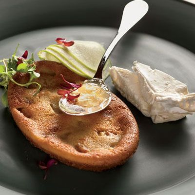 This lightly sweet pastry, studded with caramelized apple, is one component of an elaborate dish entitled Brillat-Savarin. Its major ingredients — apples, crème fraîche, Calvados, and the Brillat-Savarin cheese — all come from Normandy in France.<br /><br /><b>Recipe:</b> <a href="/recipefinder/caramelized-apple-clafoutis-recipe-fw0710" target="_blank"><b>Caramelized Apple Clafoutis</b></a>