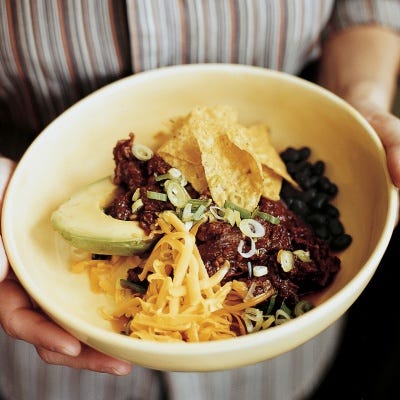 <p>Chili con carne, a Texan creation, is a traditional one-dish dinner. Toppings — avocado, scallions, tortilla chips, and cheese — are up to each guest. If you are feeling festive make a big batch of this beer-based chili and set out a topping bar for a casual, yet impressive, dinner party. </p> <p><br/><strong>Recipe:</strong> <a href="http://gogonow.org/recipefinder/chili-con-carne-recipe-mslo0215%22 target="_blank"><strong>Chili Con Carne</strong></a></p>
