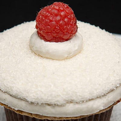 <p>These cheery little cupcakes come courtesy of Amy Berman from Vanilla Bake Shop. Vanilla bean buttercream and Meyer lemon curd await beneath the crowning ripe raspberry.</p><br /><p><b>Recipe: <a href="/recipefinder/meyer-lemon-raspberry-cupcakes-recipe" target="_blank">Meyer Lemon Raspberry Cupcakes</a></b></p>