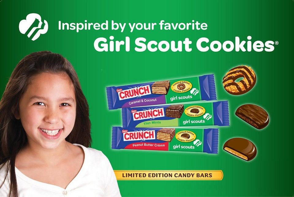 Finger food, Tooth, Dessert, Logo, Advertising, Baked goods, Snack, Junk food, Confectionery, Chocolate, 