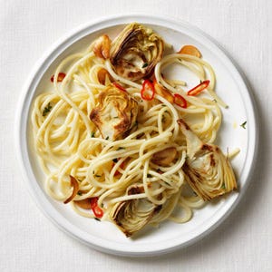 <p>If you can't find frozen artichoke hearts, canned will work as well. Be sure to drain them and pat them dry before using to avoid adding excess liquid to the dish.</p>
<p><strong>Recipe:</strong> <a href="http://gogonow.org/recipefinder/spaghetti-with-artichokes-and-lemon-thyme-garlic-oil-recipe%22 target="_blank"><strong>Spaghetti with Artichokes and Lemon-Thyme Garlic Oil</strong></a></p>