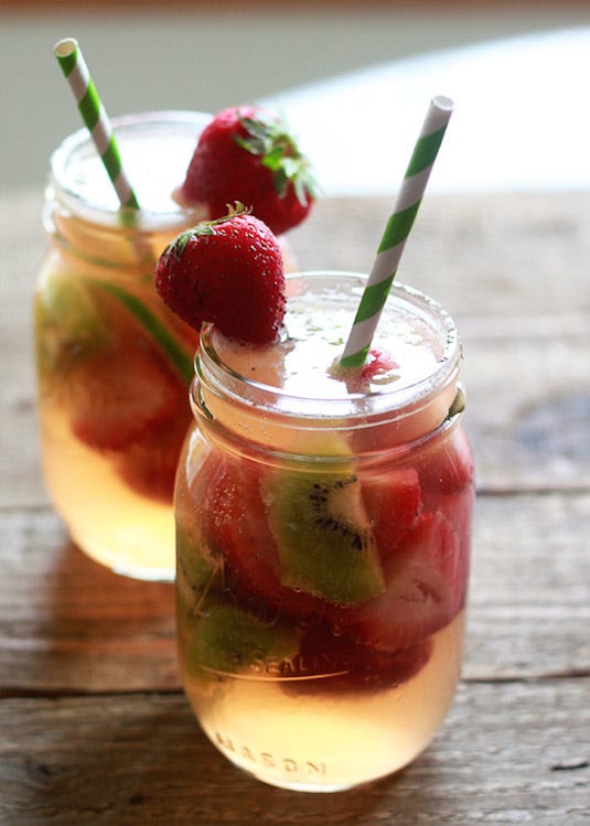Food, Produce, Fluid, Ingredient, Natural foods, Tableware, Cocktail, Liquid, Cocktail garnish, Fruit, 