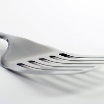 <p><b>6.</b> To flip the fish easily, here's a great trick that not every Grill Master knows about. Using two fine-edged spatulas, lift the fish fillet underneath from both sides and flip the fish. Then cover and cook until the fish has reached desired doneness. If you don't have two spatulas handy, simply try using a fork. You can work the fork tines between the grill bars and gently lift up the fillets, then turn over. When cooked properly, the meat will be firm to the touch, flake easily with a fork, and appear opaque all the way through.</p><br />
<p><b>Recipe Idea: <a href="/recipefinder/grilled-swordfish-tomato-cucumber-salsa-recipe-8018" 
target="_blank">Grilled Swordfish with Tomato-and-Cucumber Salsa</a></b></p>