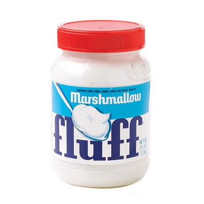 Apply a thin layer of marshmallow spread to body parts and roll in your candy coating. Attach heads, ears, and snouts with a dab of spread. Let sit for half an hour before handling.