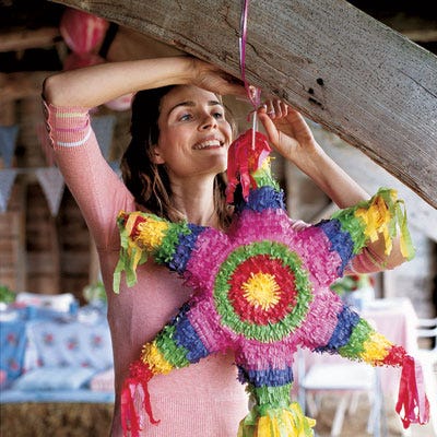Guests will have a fine time at a farmhouse picnic that's as much fun for teens and children as it is for adults.
A vibrant palette will give the party its cheerful country look, and a playful piñata ensures the party will end with favors that drop from the sky (find one at <a href="http://www.talkingpinatas.com"target="_blank">talkingpinatas.com</a>).
