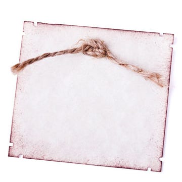 Here's a way to dress up your dining room and make space on the table for heaping plates of food: Tie ribbon (any width or pattern is fine) around the backs of chairs and hang on folded place cards.