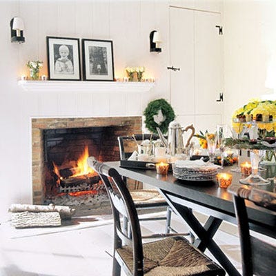 <p>Fresh flowers and glowing votives create an elegant ambience.</p>