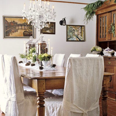 <p>Apothecary jars filled with pine cones make a naturally striking centerpiece.</p>