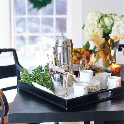 <p>For post-dinner coffee and tea, organize cups and saucers along with fun additions like sugar sticks, fresh herbs, or candy canes for a peppermint kick.</p>