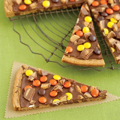<p>Using store-bought, refrigerated chocolate chip cookie dough, party-goers can create a sweet take on an already popular dish with our <a href="http://gogonow.org/recipefinder/peanut-butter-cookie-pizza%22 target="_new">Peanut Butter Cookie Pizza</a>.</p><br />  

<p>The recipe calls for chocolate peanut butter cups and candy-coated peanut butter pieces for toppings, but you can choose an assortment of candy. If it's a big party, make more than one pizza and let everyone choose their toppings from a candy buffet station.</p>