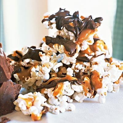 <p>This milk-chocolate-and-caramel-covered popcorn treat is a hit with kids and adults alike. Your guests won't be able to resist ripping into this sweet-and-salty snack.</p><br /><br /><p><a href="/recipefinder/turtle-corn-3960" target="_blank"><b>Get this recipe!</b></a></p>