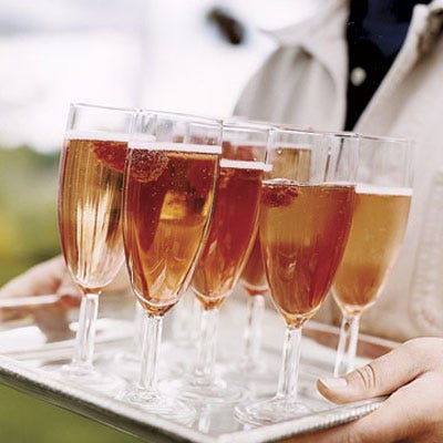 Champagne is the perfect drink for a celebration. Add peach schnapps or peach juice to make Bellinis. Finish with a fresh raspberry in each glass.