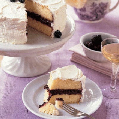 Filled with cassis-spiked blackberry jam and coated with lemon buttercream, our Lemon-Blackberry Cake is both delicious and beautifully display-worthy for a party. <br /><br /><b>Recipe: <a href="/recipefinder/lemon-blackberry-cake-3802" target="_blank">Lemon-Blackberry Cake</a></b>