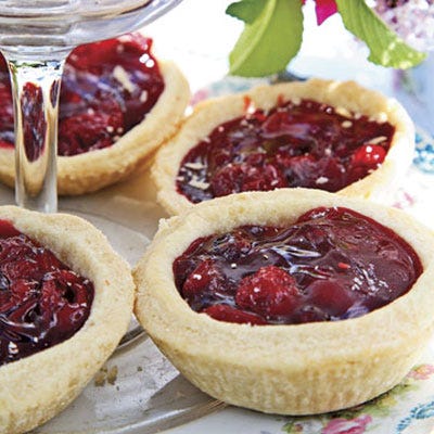 For an easy dessert option, fill store-bought tartlet shells with fresh conserves.