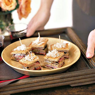 For a light luncheon, serve easy-to-eat sandwich bites. Wooden hors d'oeuvre picks — also found in pink and blue — keep the many layers in place.
<br /><br />
<b>Recipe: <a href="/recipefinder/mini-triple-decker-pastrami-reuben-sandwiches-3219"target="_new">Mini Triple-Decker Pastrami Reuben Sandwiches</a></b>
