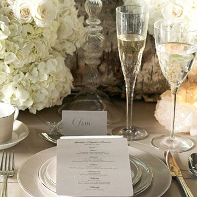 <p>"Decide on a color 'story' and carry it through to the china, napkins, flowers, menu," suggests Lhuillier. She also suggests, "A printed menu on a napkin is a more modern look than a napkin ring — and shows you took the time to plan a wonderful meal." And flowers? Says Lhuillier, "Oh, I love an abundance! And lots and lots and lots of candles." </p><br></br>
From the Monique Lhuillier Collection for Royal Doulton: Femme Fatale dinnerware and Atelier stemware and flatware; available at Bloomingdale's.</p>