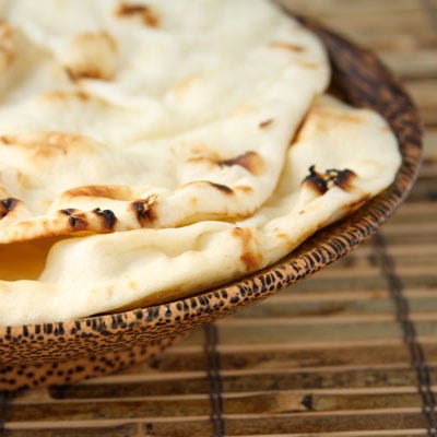 Host of Food Network's <a href="http://www.foodnetwork.com/nigella-express/index.html" target="_blank"><b><i>Nigella Express</i></b></a> and author of <a href="http://search.barnesandnoble.com/booksearch/isbnInquiry.asp?EAN=9781401322434&lkid=J25249592&pubid=K125307&byo=1" target="_blank"><b><i>Nigella Express: Good Food Fast</i></b></a><br /><br /><b>Secret Shortcut:</b> Naan<br />"At times when I'm pretending to indulge the children, but am really too exhausted to cook, I order pizza. But actually [making Naan Pizza] is my preferred option. This is not much harder to cook than making a phone call, and I feel much happier for it."<br /><br /><b>Recipe: <a href="/recipefinder/naan-pizza-recipe" target="_blank">Naan Pizza</a></b>