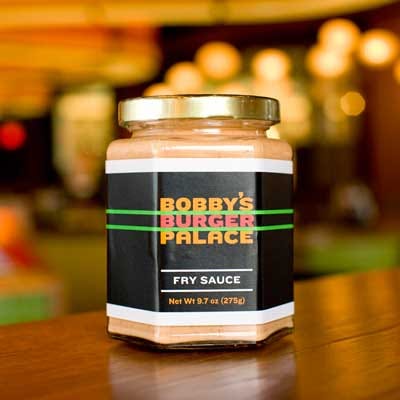 Does Dad love Bobby Flay <i>and</i> French fries? Well, then he's going to love the Iron Chef's secret condiment to spice up crispy potatoes. (<a href="http://www.bobbysburgerpalace.com/shop.php" target="_blank">Bobby's Burger Palace Fry Sauce</a>, $10)
