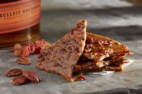 <p>You may not need to know anything beyond the ingredients with this deviously sweet snack — Bulleit Bourbon, pecans, and Niman Ranch bacon — to be hooked. Warm bourbon and smoky bacon cut the sweetness of the brittle just enough to leave you wanting more, like a candy version of a Godfather you're free to enjoy all afternoon at your desk. The lightly sweet finish of Bulleit rounds out the brittle without an overly aggressive boozy punch, resulting in a candy that brings out the candy-scarfing pig in all of us. Embrace it, or share with friends, either way it's a holiday, so you're entitled. </p>
<p><em>"The Filthy Pig" Whiskey Brittle; $7 for 4 ounces; <a href="http://cart.sugarknife.com/product/bulleit-bourbontm-bacon-pecans" target="_blank">buy here</a></em></p>