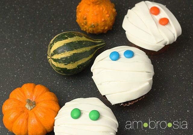<p>Have kids help "bandage" these mummies in fondant before they devour them.</p>
<p><strong>Get the recipe from <a href="http://www.ambrosiabaking.com/2011/10/how-to-make-mummy-cupcakes.html" target="_blank">Ambrosia</a>.</strong></p>