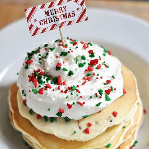 <p>No one can say no to a tall plate of chocolate chip pancakes, especially when topped with homemade whipped cream and festive sprinkles!</p> <p><strong>Get the recipe from <a href="http://cherishedbliss.com/chocolate-chip-pancakes-homemade-whipped-topping-recipe/" target="_blank">Cherished Bliss</a>.</strong></p>
