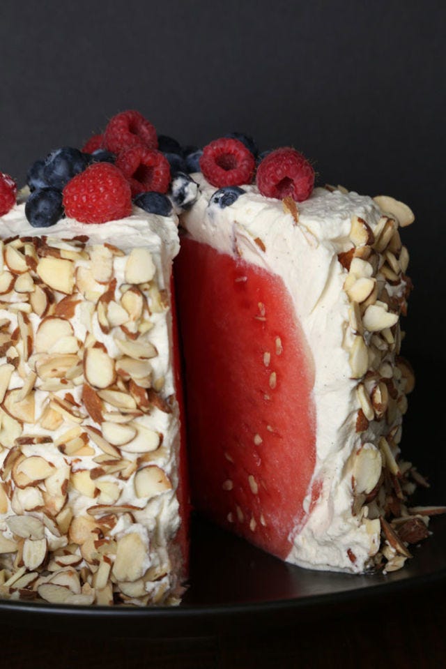 The fun of this cake is the reveal. Don't let anyone in on the secret until you begin slicing. If you're skeptical of this strange combination of flavors, don't be! The sweet, juicy watermelon; crunchy almonds; tart berries; and fluffy whipped cream taste refreshing and light together.