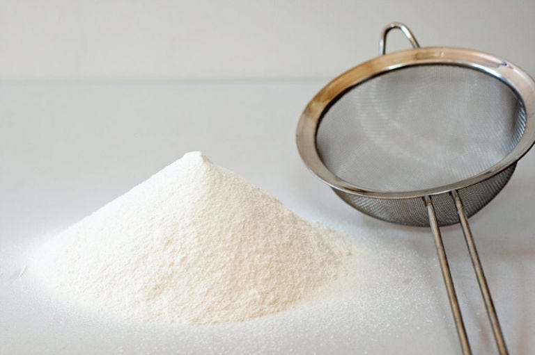 <p>Sift the dry ingredients — for eight portions of pasta: 3 1/2 cups type <a href="http://www.amazon.com/gp/product/B0038ZS6PU" target="_blank">00 flour</a> and a generous pinch of salt — together onto a clean work surface. </p>