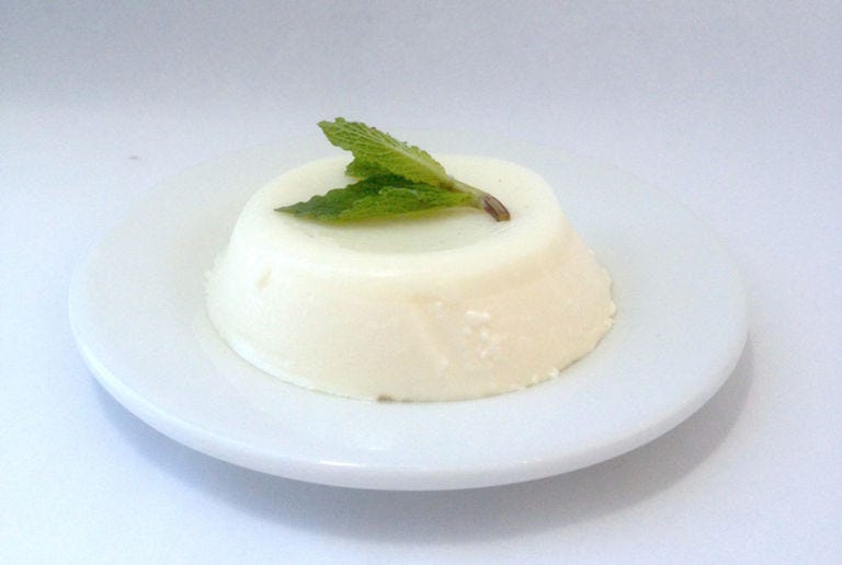<p>These individual panna cottas, served in ramekins, are perfect for your next outdoor party.</p> <p>Sprinkle 1 package <strong>unflavored gelatin</strong> over 3 tablespoons <strong>cold water</strong>. Heat 1 1/2 cups <strong>whole milk</strong>, 1 cup <strong>heavy cream</strong>, 1/3 cup <strong>granulated sugar</strong>, 2/3 cup <strong>mint leaves</strong>, 1 1/2 teaspoon <strong>bourbon</strong> and 1/8 teaspoon <strong>salt</strong> on high until just bubbling, stirring, until sugar dissolves.</p> <p>Remove from heat; strain into clean bowl and stir in gelatin mixture. Divide among 8 lightly greased 4-ounce ramekins. Refrigerate at least 4 hours or up to 1 day. Run pairing knife around sides of cups; invert each onto a small serving plate. Garnish with <strong>mint sprigs</strong>.</p>